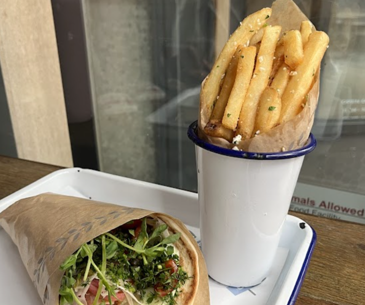 Souvla signature dishes Chicken Sandwich
Chicken Salad
Greek Fries